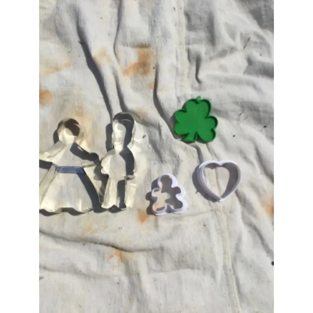 Vintage holiday cookie cutters hallmark angel tin soldier shamrock heart metal